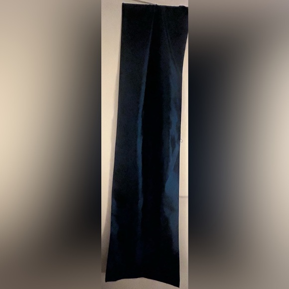 A stunning form fitting dress with an elegant neckline + sultry bold silhouette - Picture 12 of 14